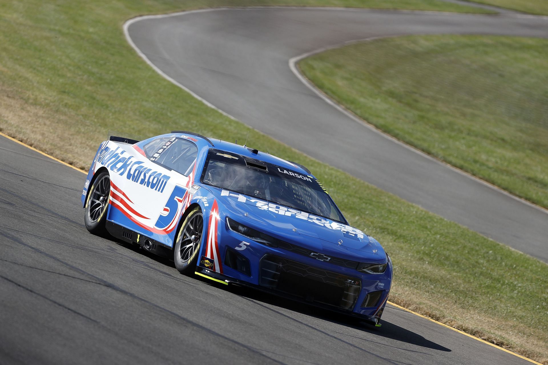 Kyle Larson drives during qualifying for the NASCAR Cup Series M&amp;M&#039;s Fan Appreciation 400 at Pocono Raceway