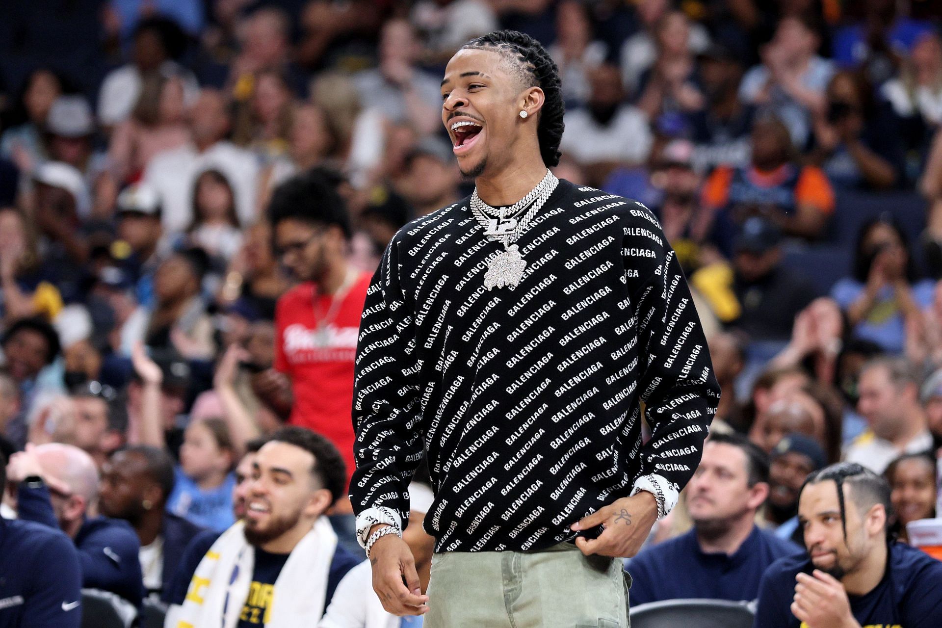 Golden State Warriors v Memphis Grizzlies - Game Five; Ja Morant celebrates from the sidelines
