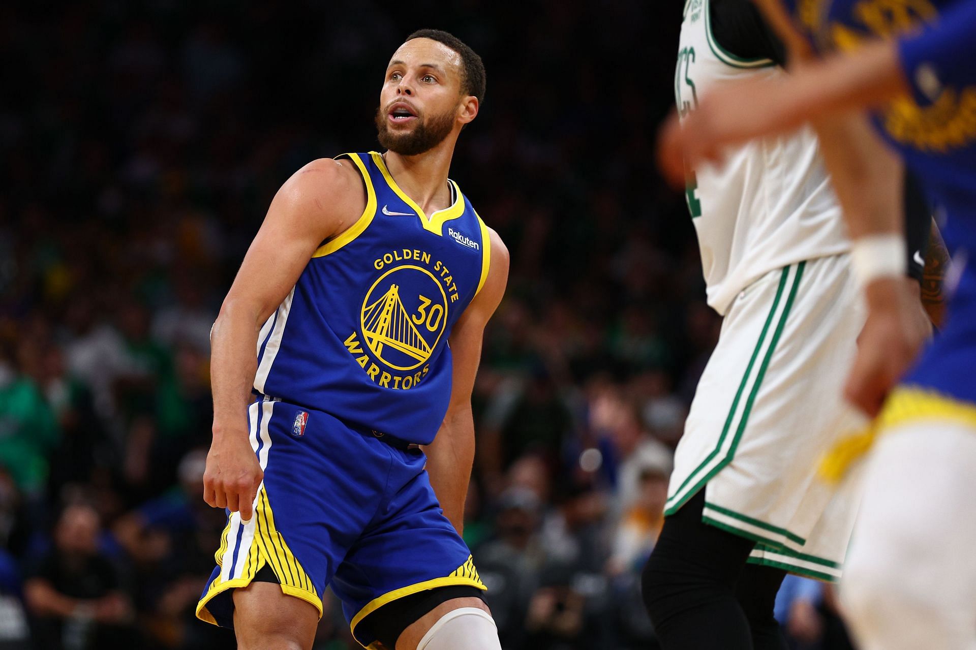 Stephen Curry reacts to a three-pointer in Game Six of the 2022 NBA Finals at TD Garden.