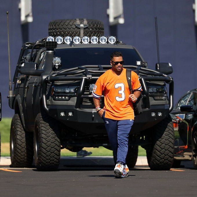 Russell Wilson shows up to Broncos training camp in own jersey