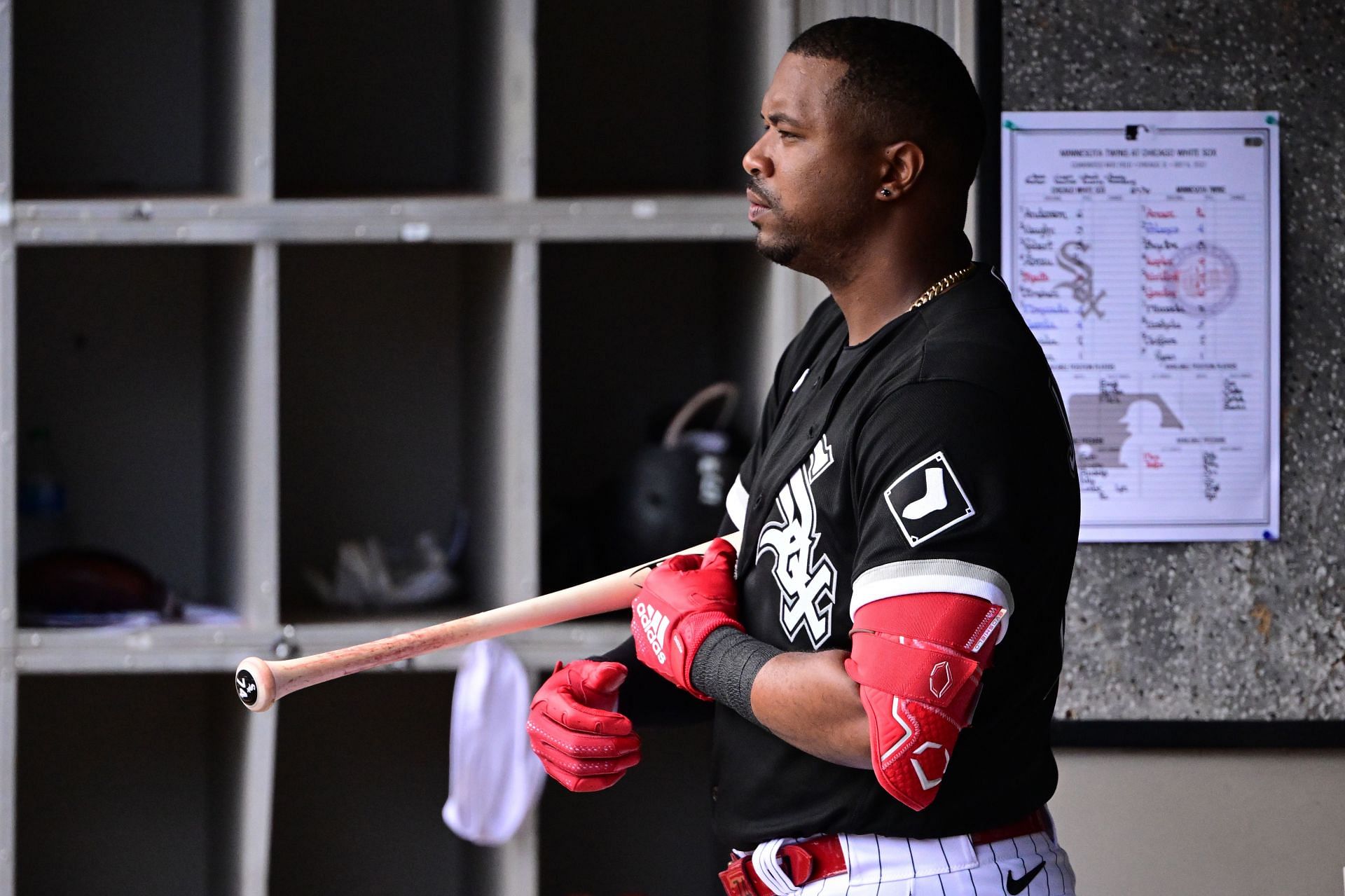 Eloy Jimenez waits in the dugout during a Minnesota Twins v Chicago White Sox game earlier this season.