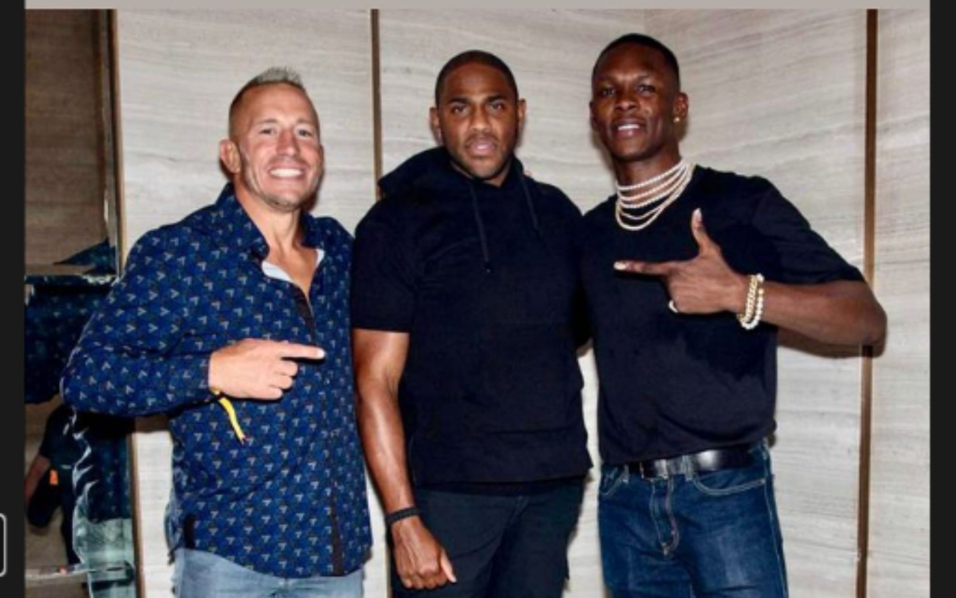 Georges St-Pierre (left) and Israel Adesanya (right) [Image courtesy of @georgesstpierre Instagram]