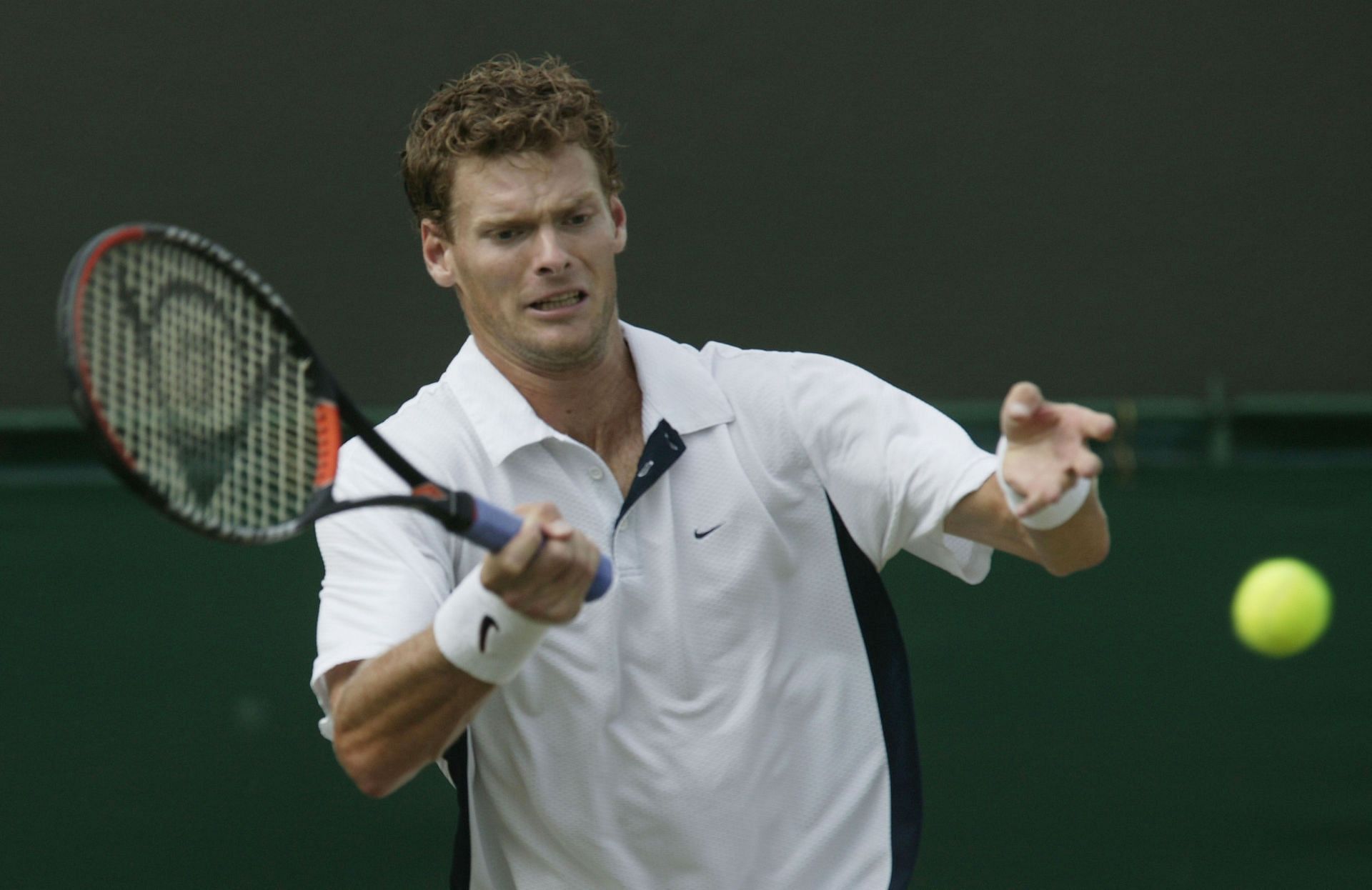 Sjeng Schalken of Netherlands in action at the 2002 Wimbledon Championships.