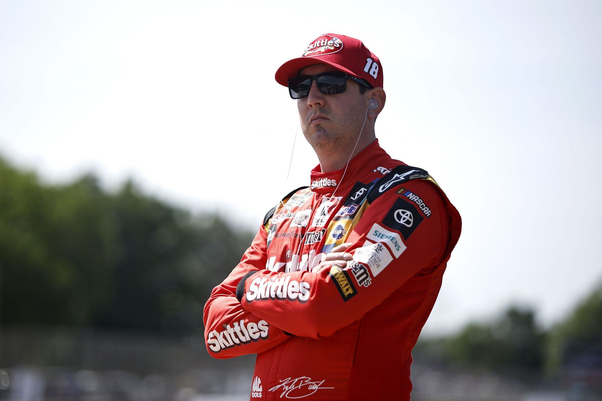 Kyle Busch looks on during practice for the NASCAR Cup Series Kwik Trip 250 at Road America