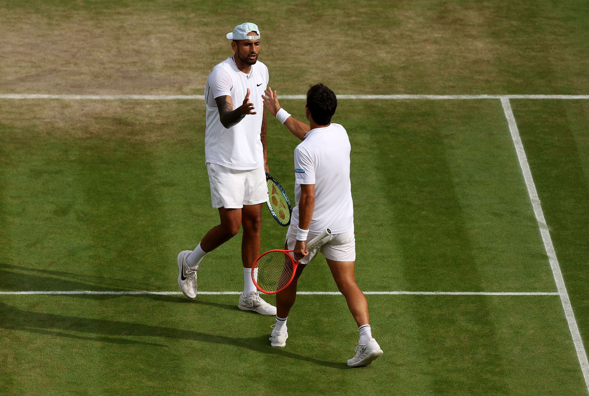 Nick Kyrgios and Cristian Garin after their 2022 Wimbledon Championships quarterfinal.