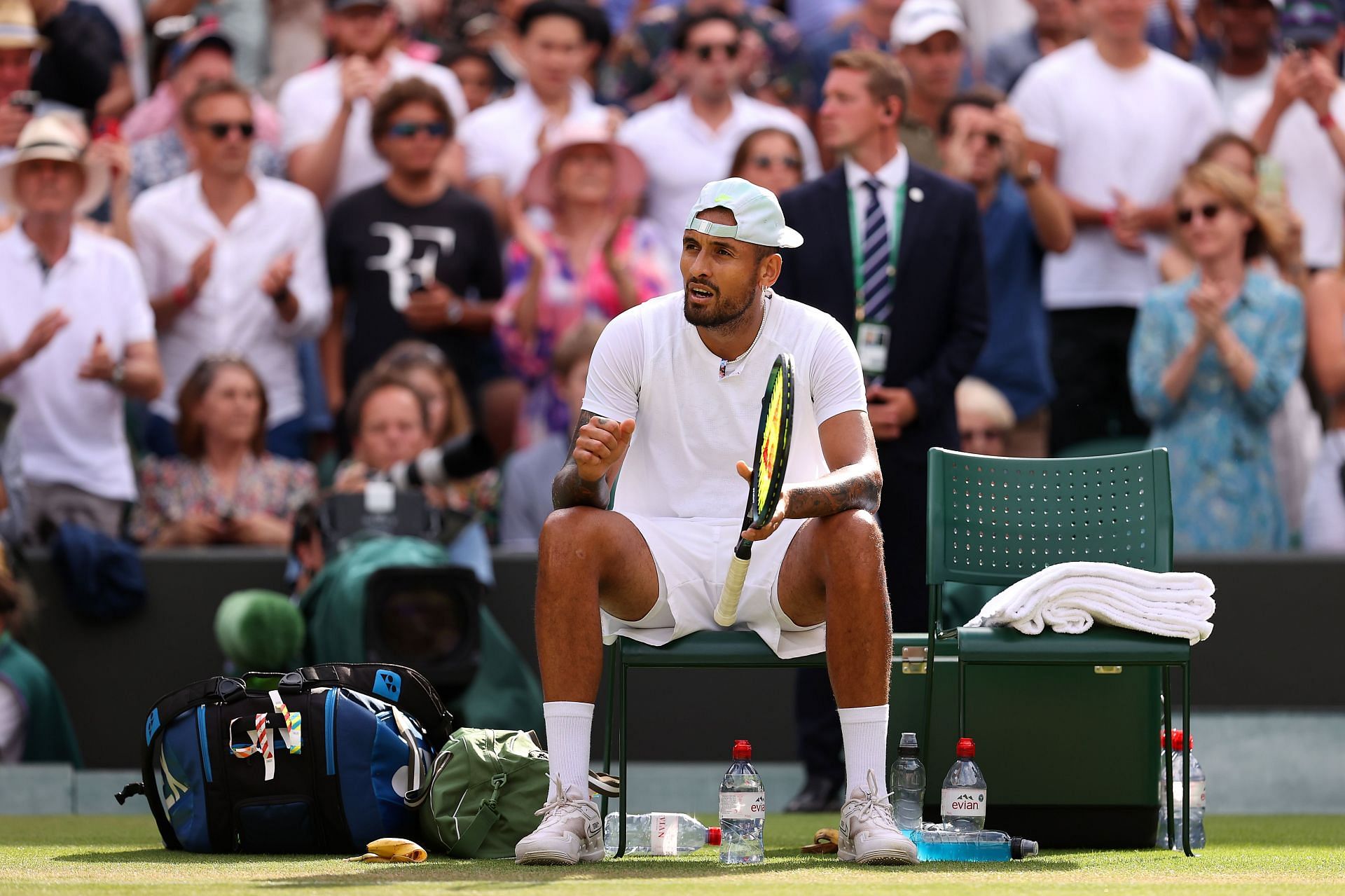 Nick Kyrgios in action at The Championships - Wimbledon 2022