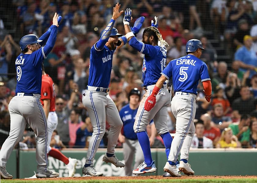 TORONTO, ON - MAY 9: Lourdes Gurriel Jr. #13 of the Toronto Blue Jays looks  on from the top step of the dugout d…