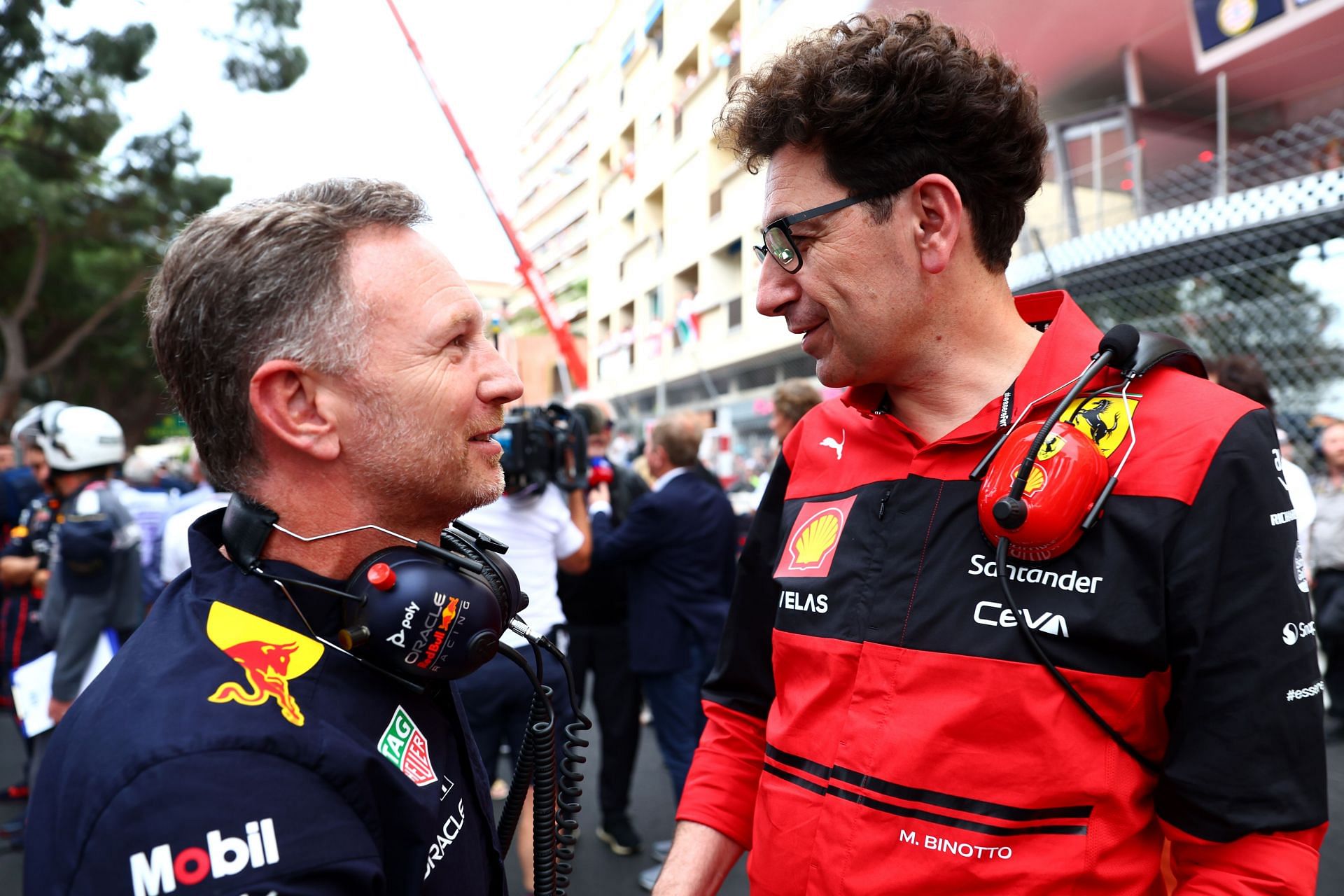 Red Bull team boss Christian Horner (left) and Ferrari team boss Mattia Binotto share a moment during the 2022 F1 Monaco GP weekend. (Photo by Mark Thompson/Getty Images)