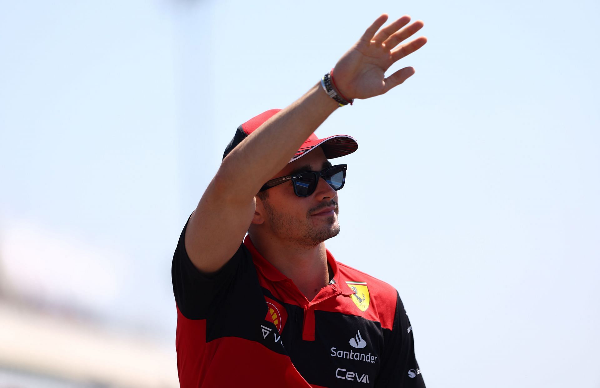 Charles Leclerc waves to the crowd on the drivers&#039; parade ahead of the 2022 F1 French GP (Photo by Clive Rose/Getty Images)
