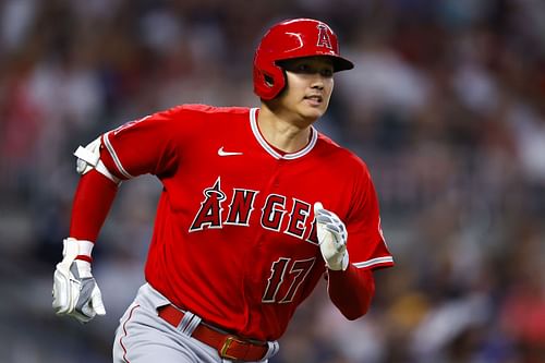 Shohei Ohtani races to first after hitting a home run during the fifth inning against the Atlanta Braves.