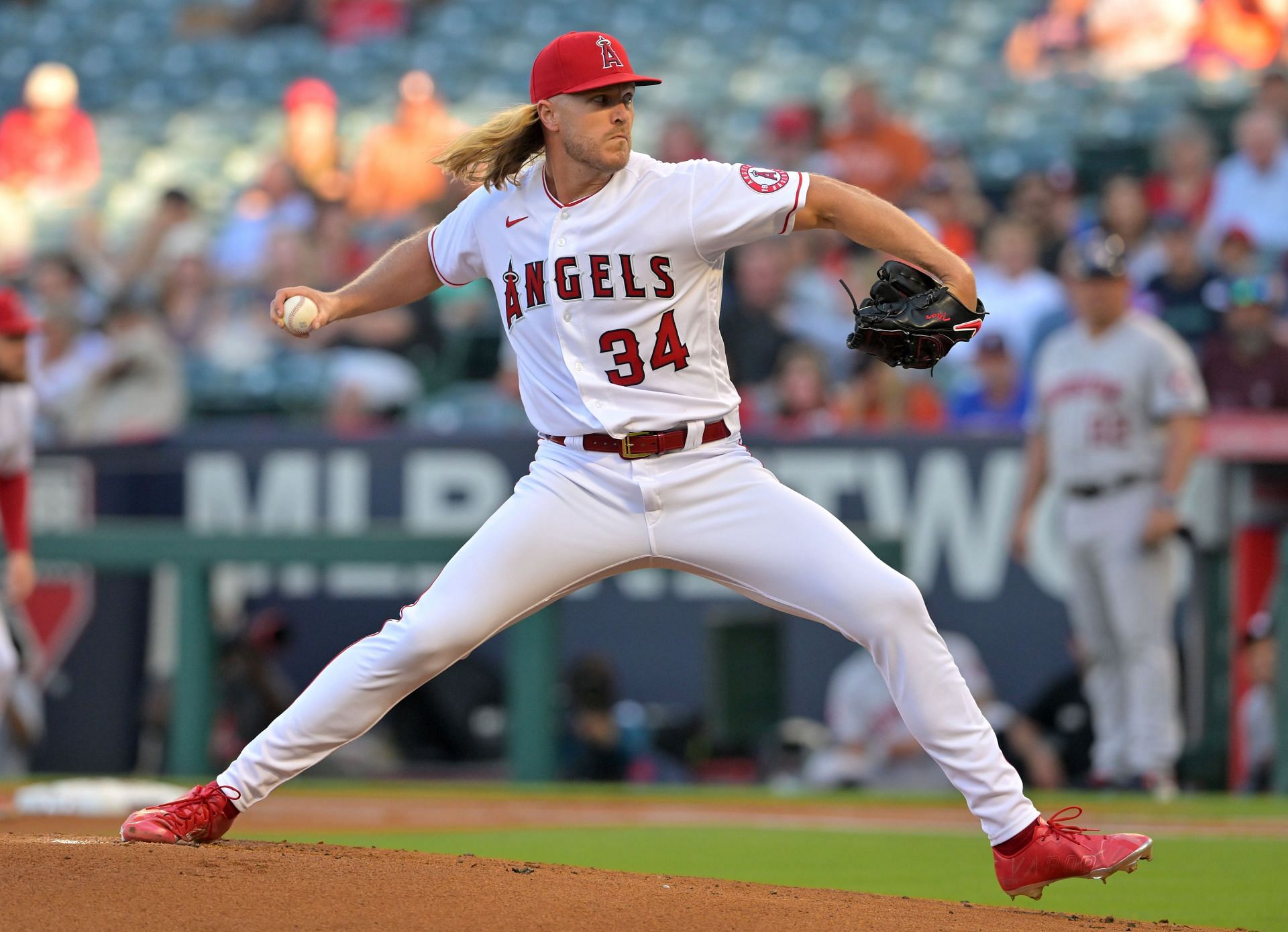 Noah Syndergaard #34 of the Los Angeles Angels pitches in the first inning against the Houston Astros at Angel Stadium