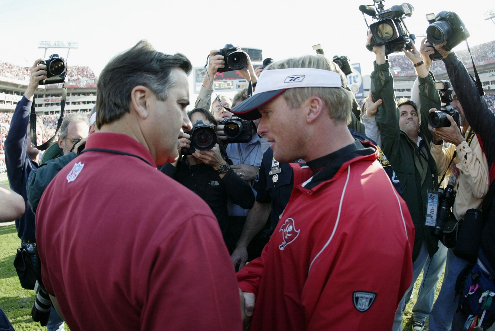 Mariucci congratulates Gruden