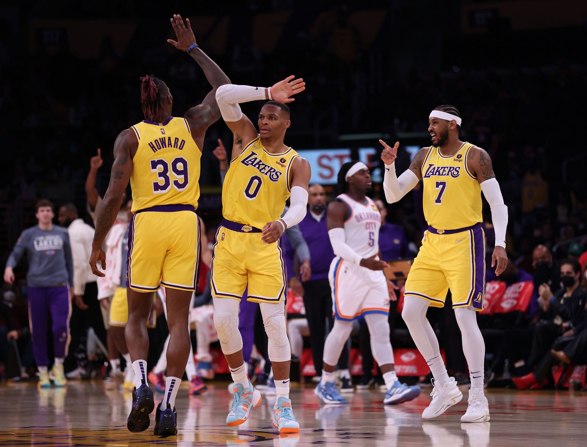 Dwight Howard (39), Russell Westbrook (0) and Carmelo Anthony of the LA Lakers