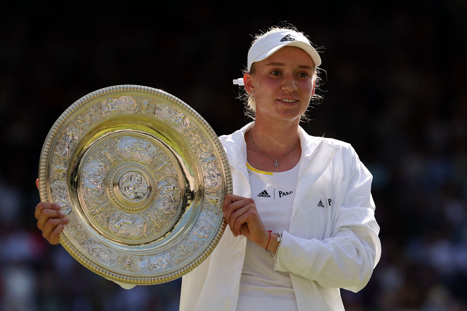 Elena Rybakina hoists aloft the Venus Rosewater Dish on Saturday at Wimbledon