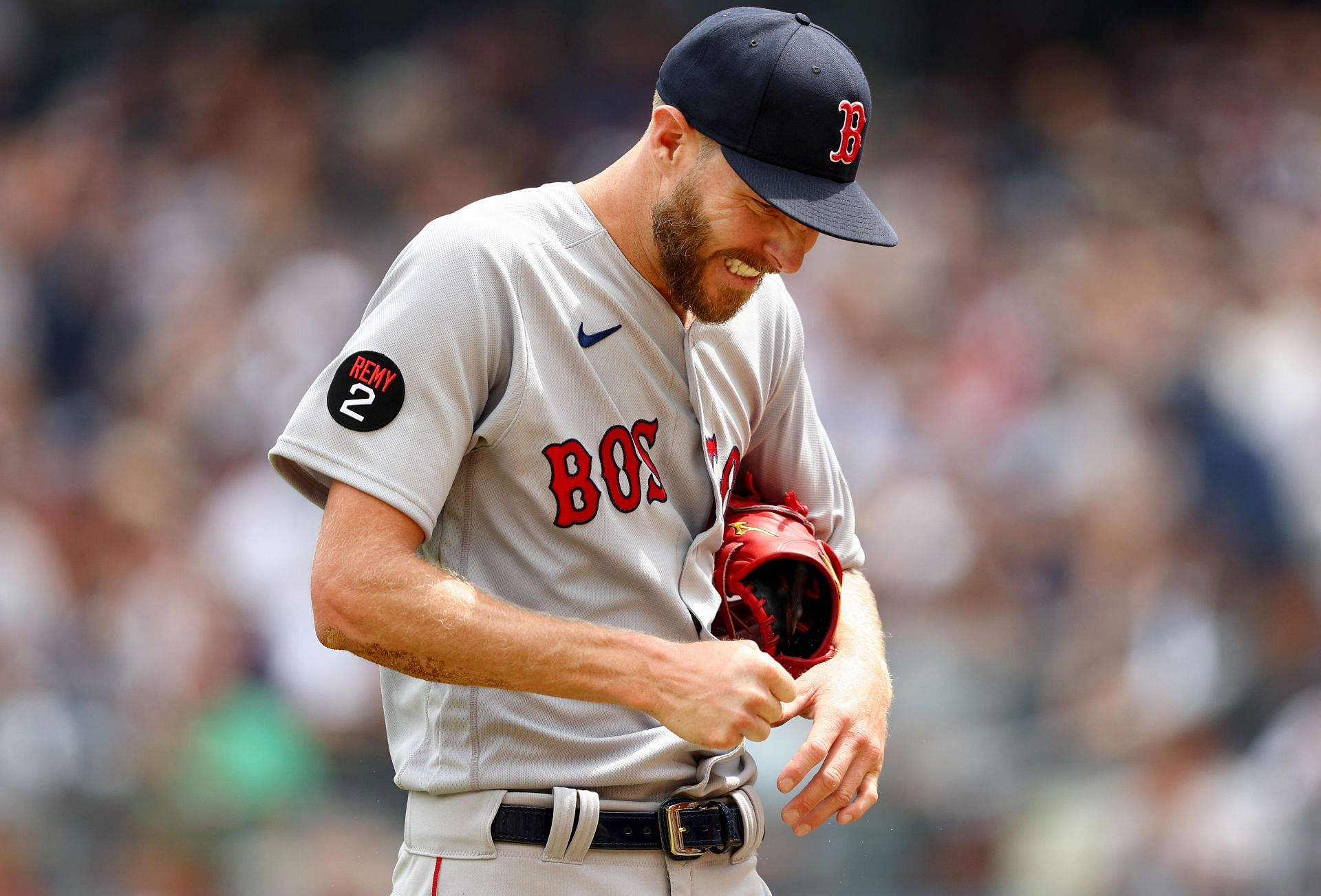 Chris Sale grimaces in pain after finger injury.