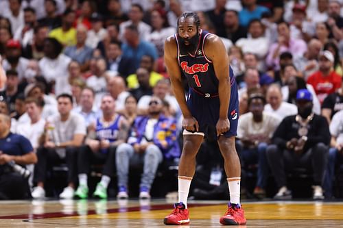 James Harden looks on at the play