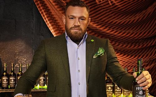 Conor McGregor holding Proper No. Twelve Irish Whiskey [Images courtesy of @properwhiskey on Instagram]