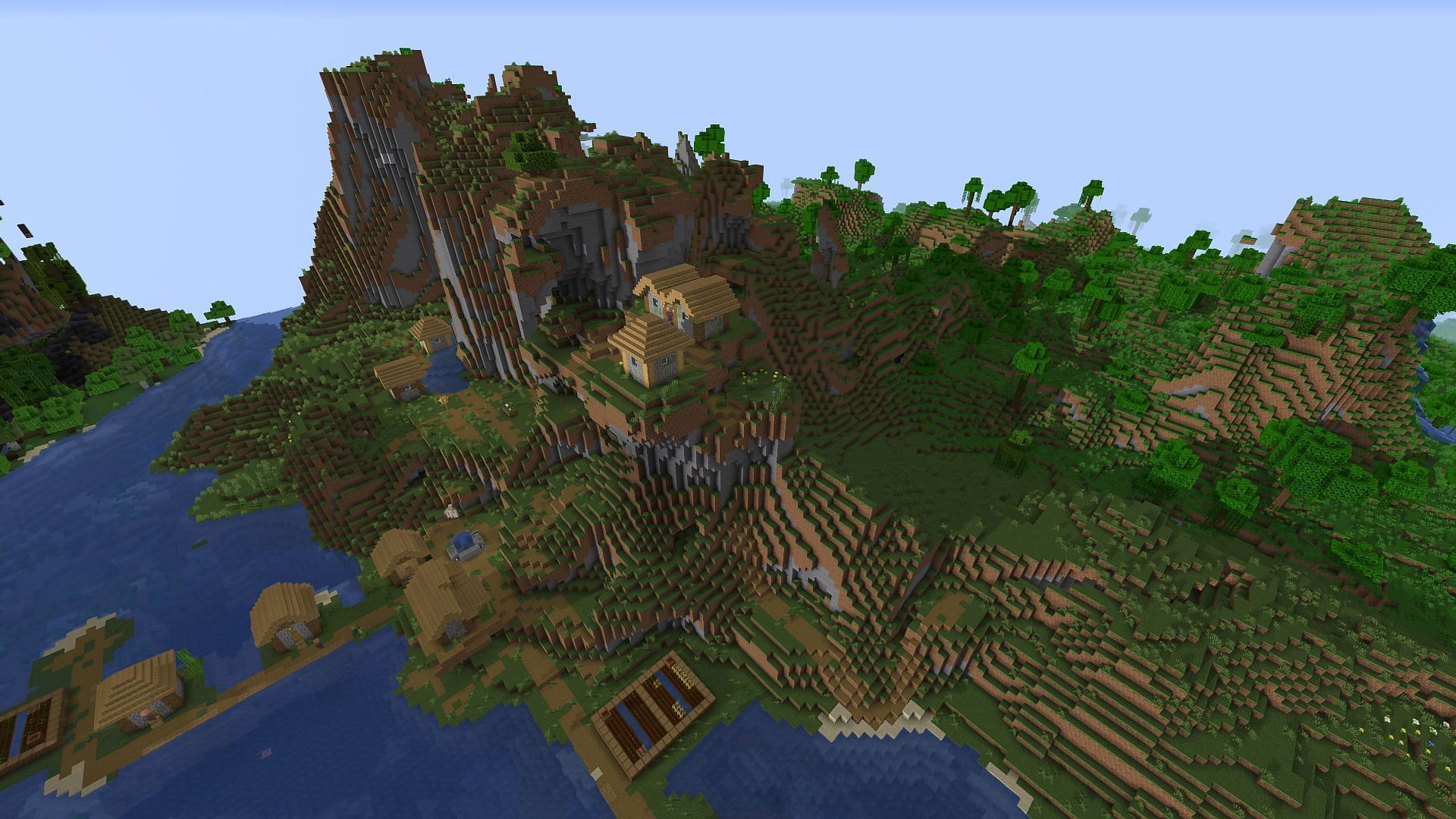 A cliffside village found near spawn (Image via Minecraft)