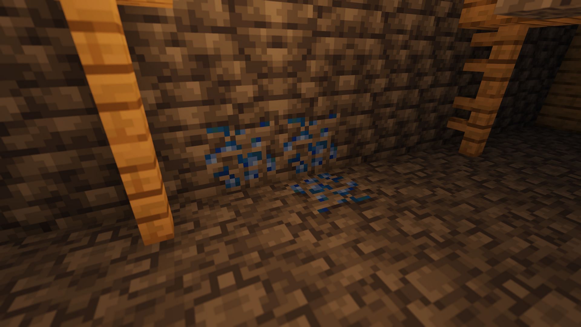 Lapis lazuli ore found in an abandoned mineshaft (Image via Minecraft)