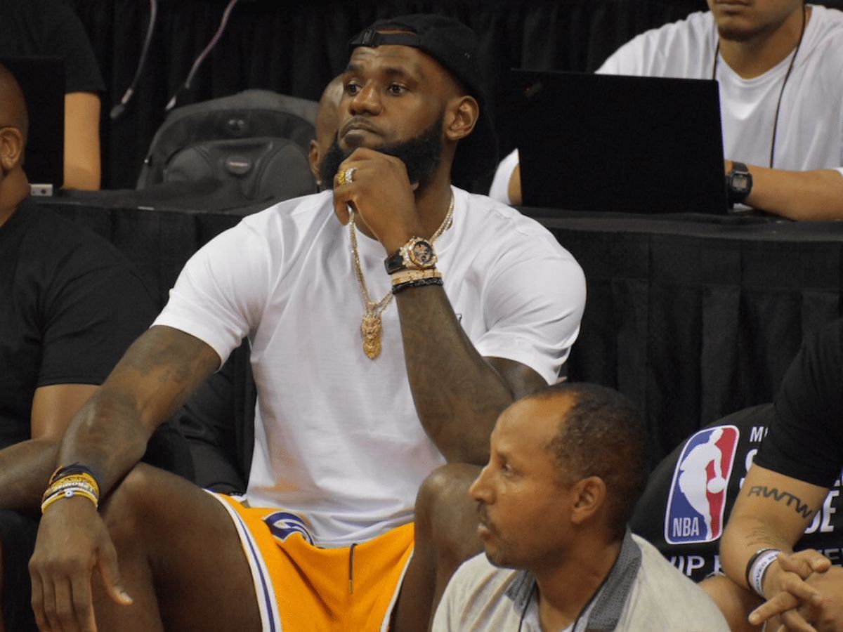 LeBron James observes the action between in a Summer League game. [Photo: Sports Illustrated]