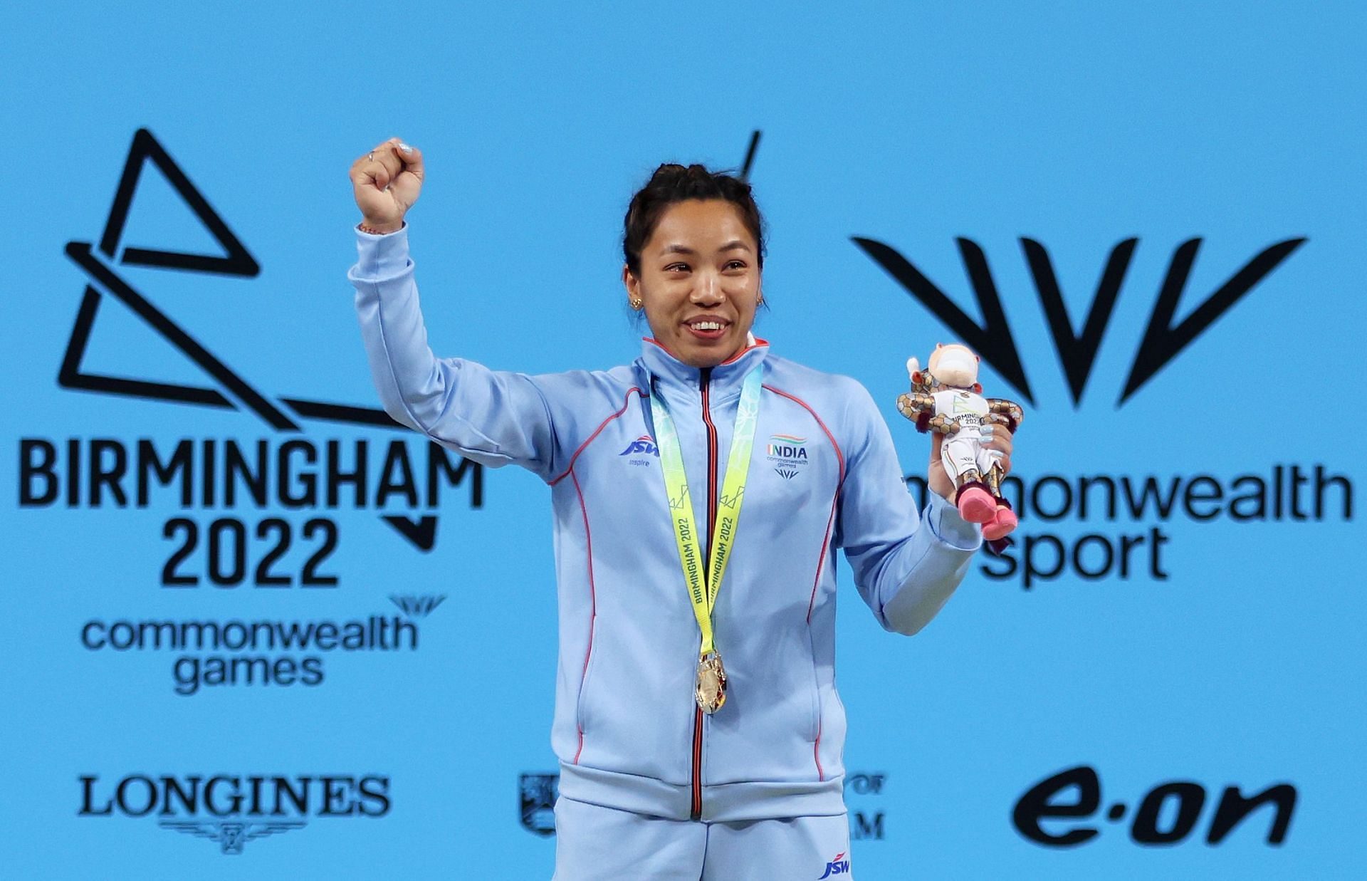 Mirabai Chanu exults on the podium after the medal ceremony. (PC: Getty Images)