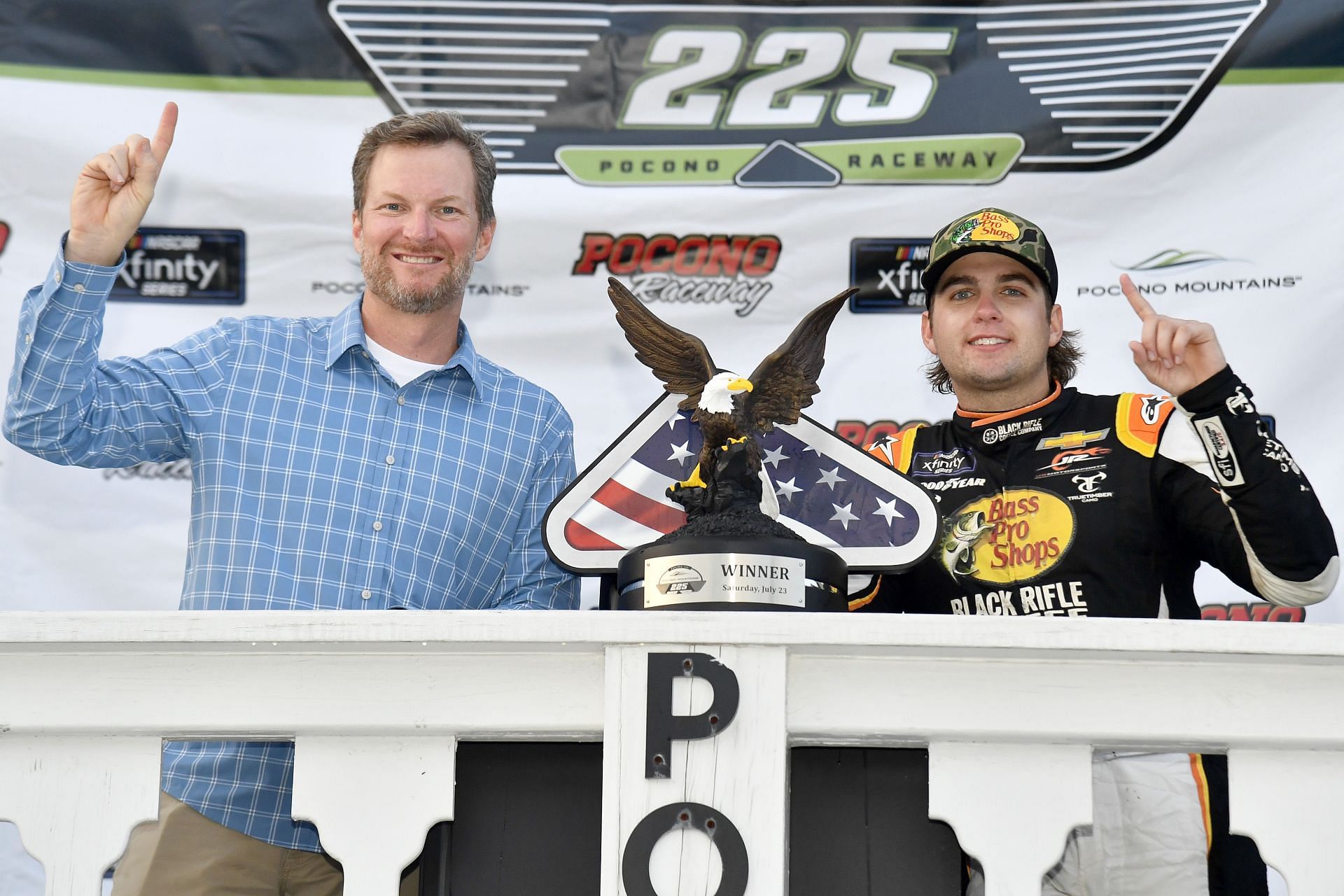 JR Motorsports owner Dale Earnhardt Jr. (left) celebrates in victory lane after winning the NASCAR Xfinity Series Explore the Pocono Mountains 225 at Pocono Raceway