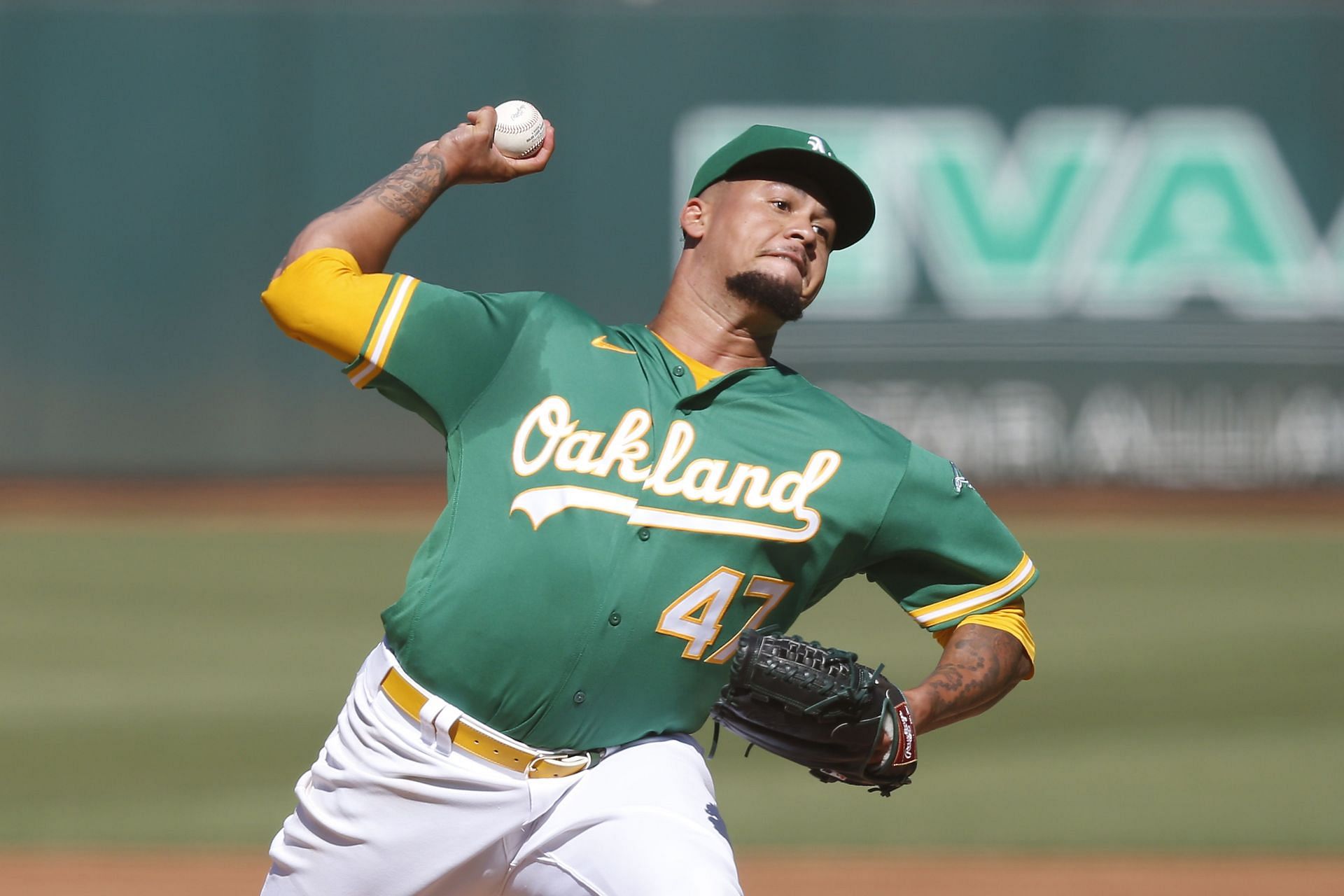 Frankie Montas pitches during a Detroit Tigers v Oakland Athletics game.