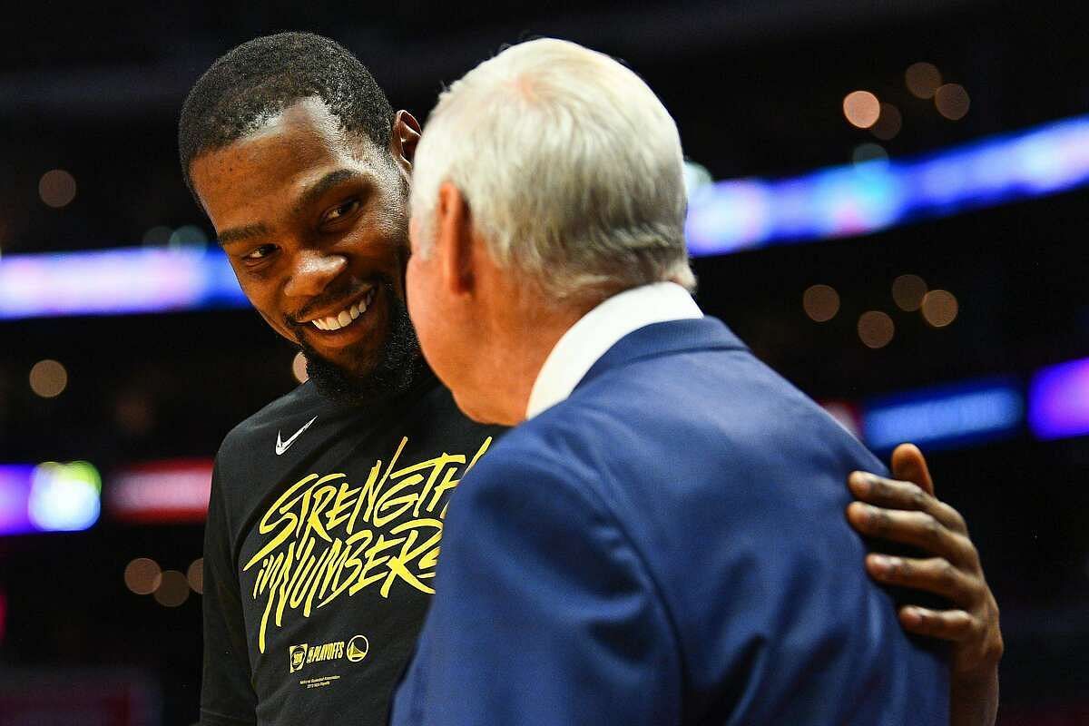 Kevin Durant, left, with LA Lakers legend Jerry West [Source: SF Chronicle]