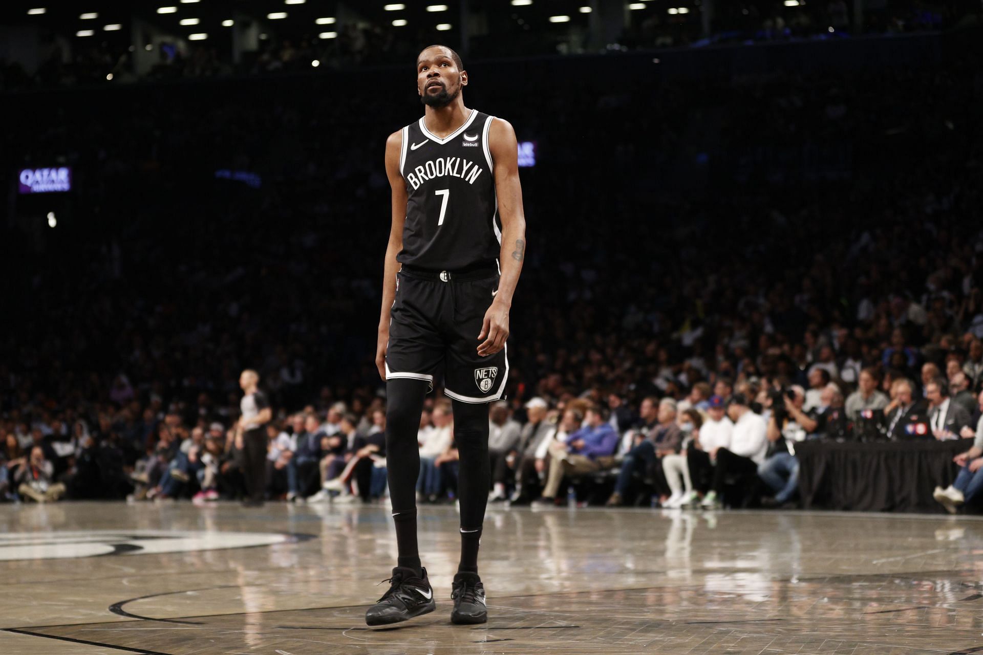 Kevin Durant looks on at the Nets game