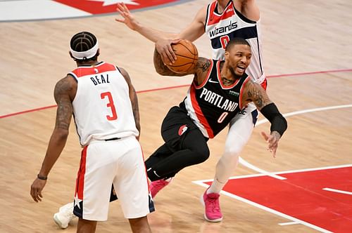 Bradley Beal #3 and Damian Lillard #0 in action during Portland Trail Blazers v Washington Wizards