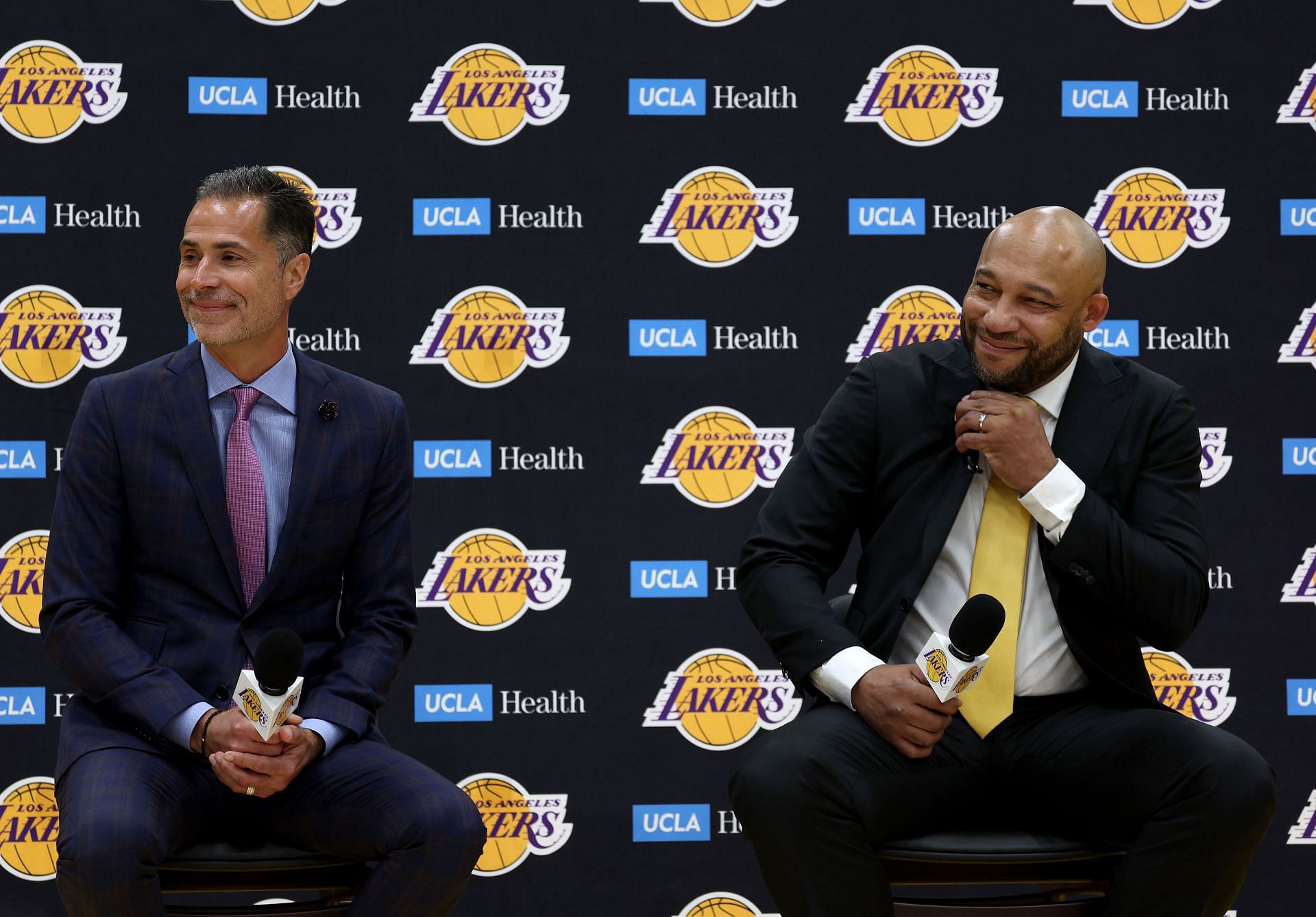New LA Lakers coach Darvin Ham, right, speaks to the media with Rob Pelinka, the team&#039;s vice president of operations.