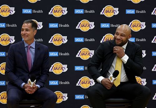 New LA Lakers coach Darvin Ham, right, speaks to the media with Rob Pelinka, the team's vice president of operations.