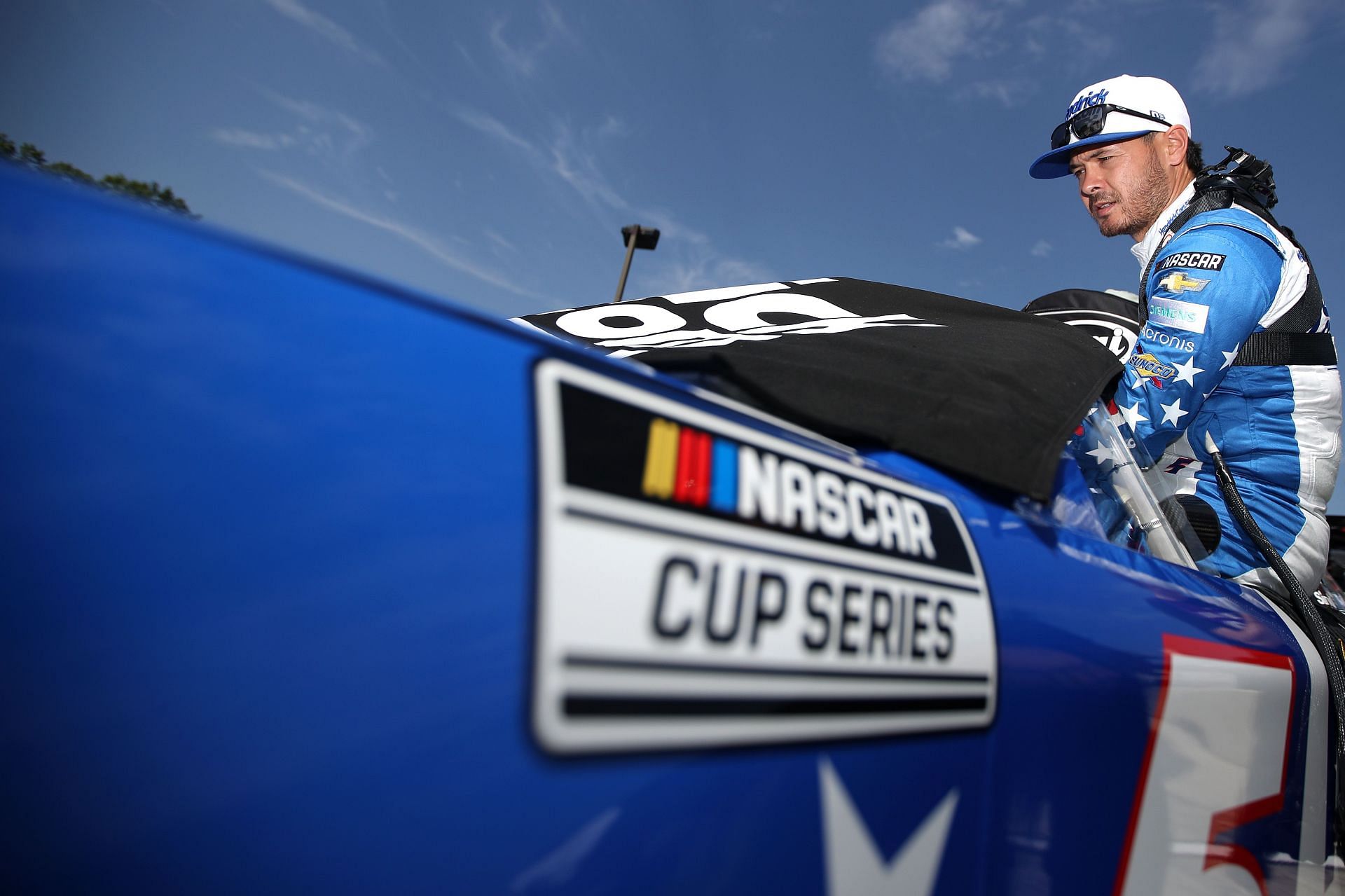 Larson enters his car during practice for the NASCAR Cup Series Kwik Trip 250 at Road America