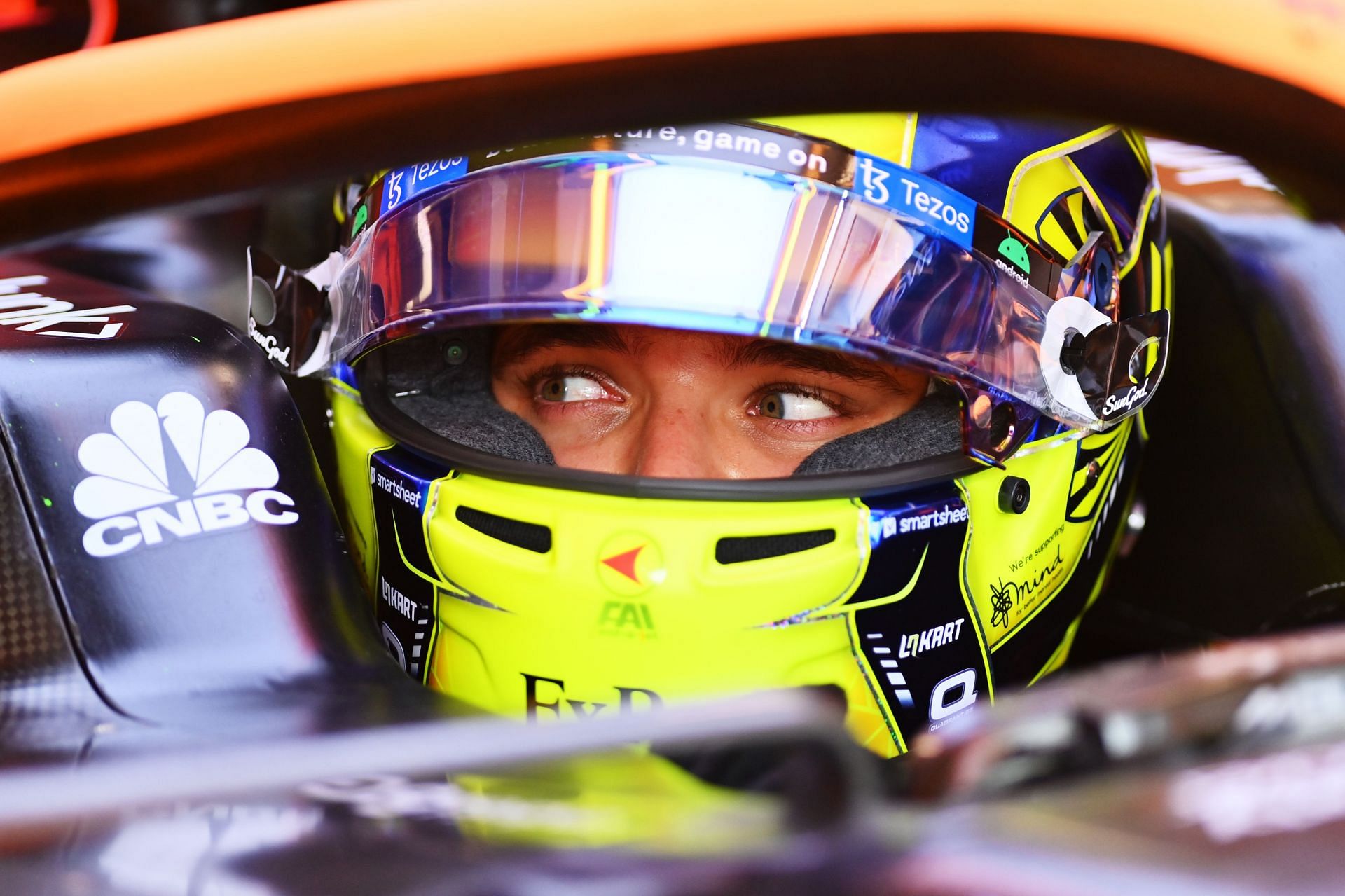 Mclaren driver Lando Norris looks on from the cockpit of his car during the 2022 F1 Hungarian GP weekend. (Photo by Dan Mullan/Getty Images)