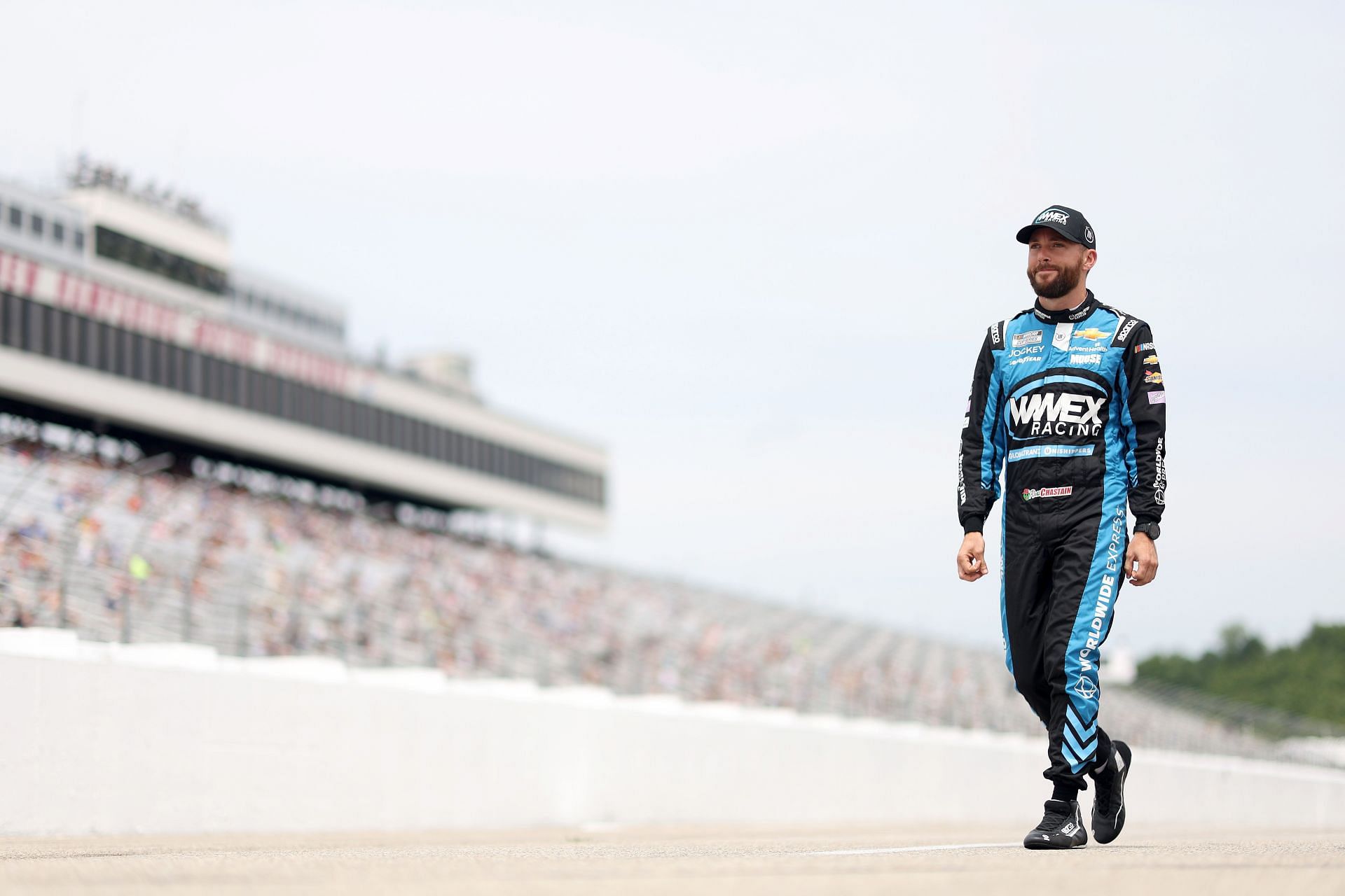 Ross Chastain walks the grid during qualifying for the NASCAR Cup Series Ambetter 301 at New Hampshire Motor Speedway (Photo by James Gilbert/Getty Images)