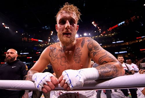 Jake Paul posing after defeating Tyron Woodley