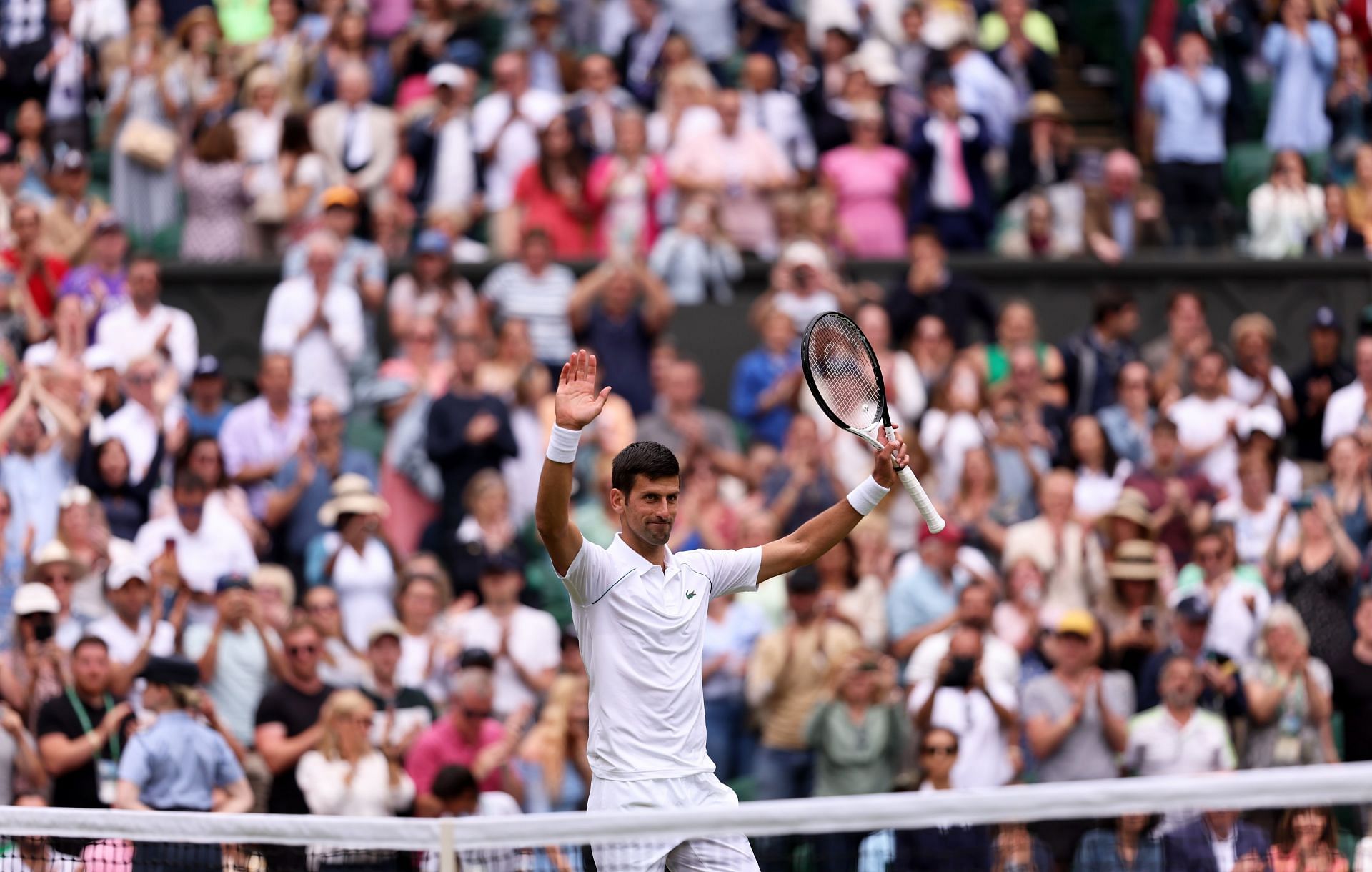 Novak Djokovic celebrates after his victory over Miomir Kecmanovic