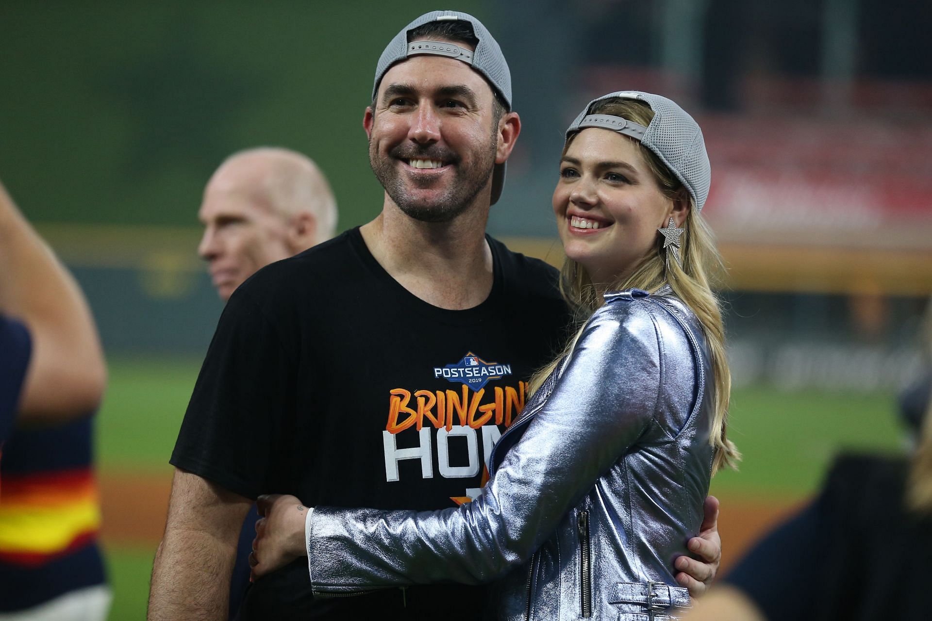 Justin Verlander (left) and Kate Upton (right) celebrate after the conclusion of the Divisional Series - Tampa Bay Rays v Houston Astros - Game Five.