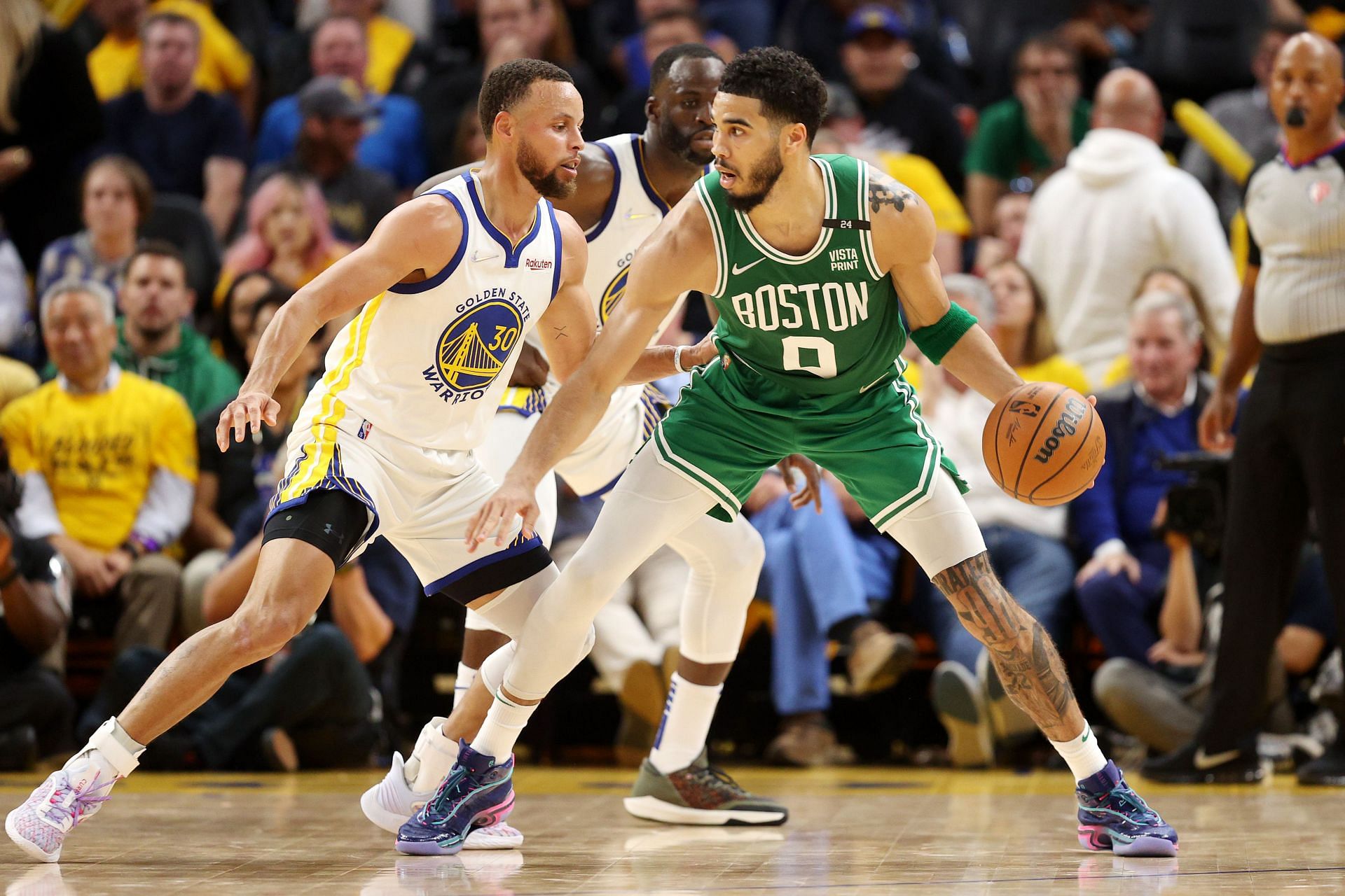 Jayson Tatum of Boston Celtics against Steph Curry of Golden State Warriors in 2022 NBA Finals