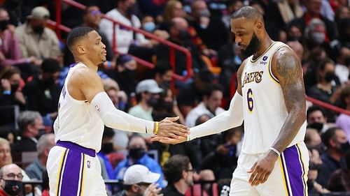 Russell Westbrook, left, and LeBron James didn't meet during the LA Lakers' Summer League game against the Phoenix Suns. [Photo: Sporting News]