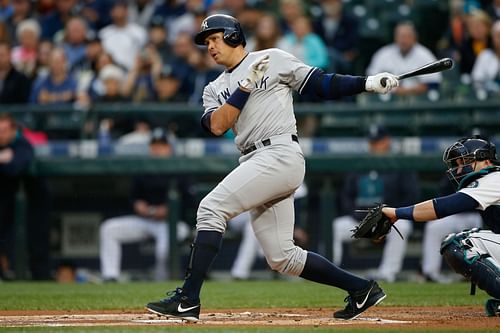 Alex Rodriguez bats during a New York Yankees v Seattle Mariners game.