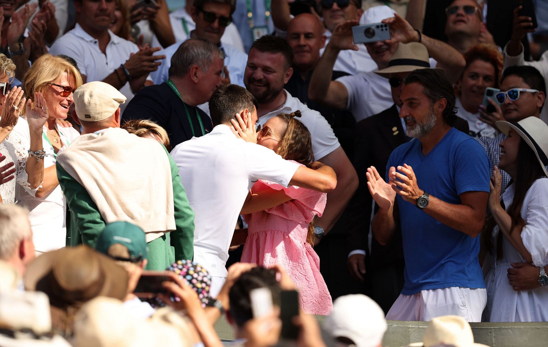 Djokovic embraces his wife after winning Wimbledon