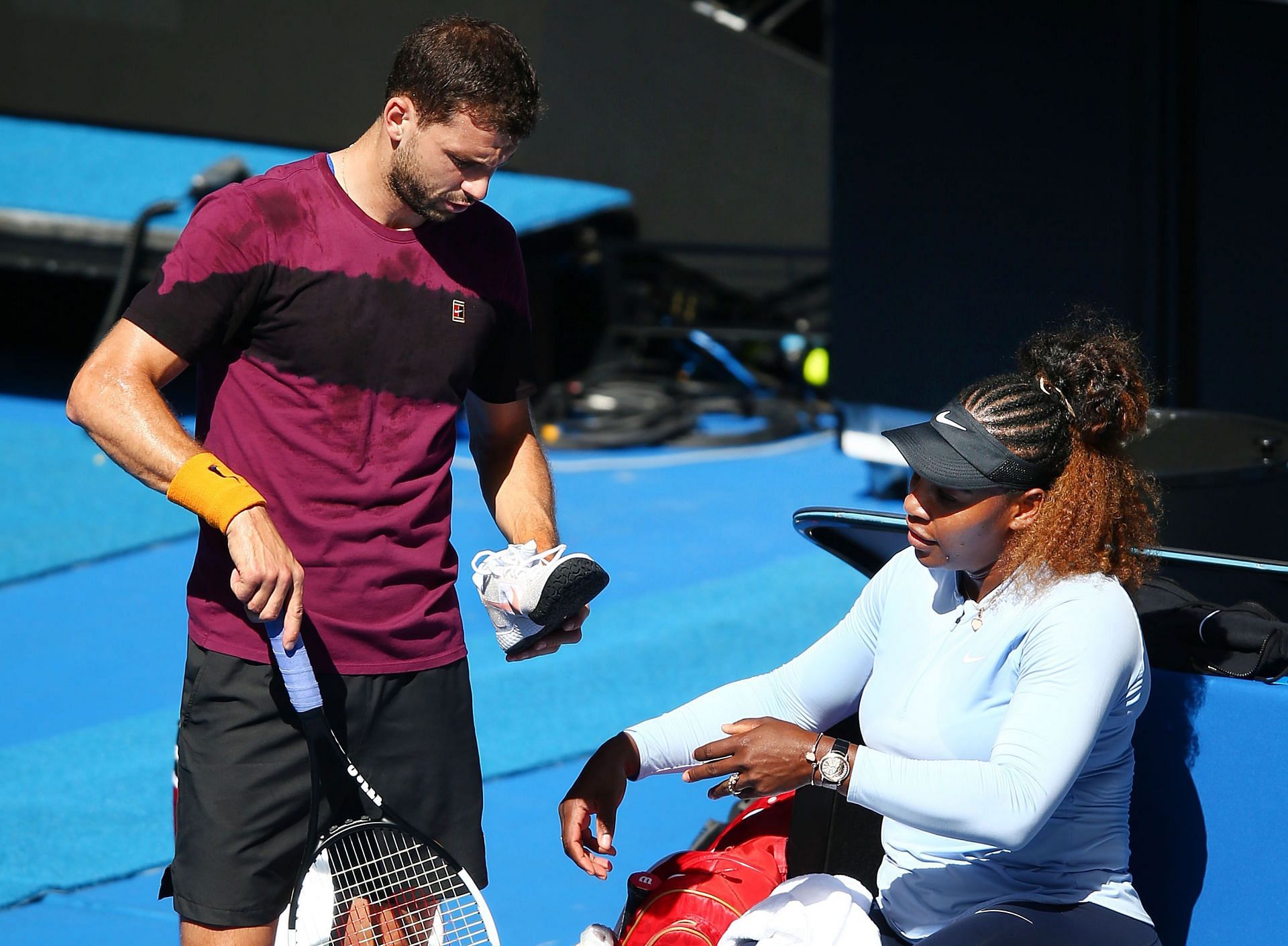 Grigor Dimitrov and Serena Williams at a practice session in the 2019 Australian Open.