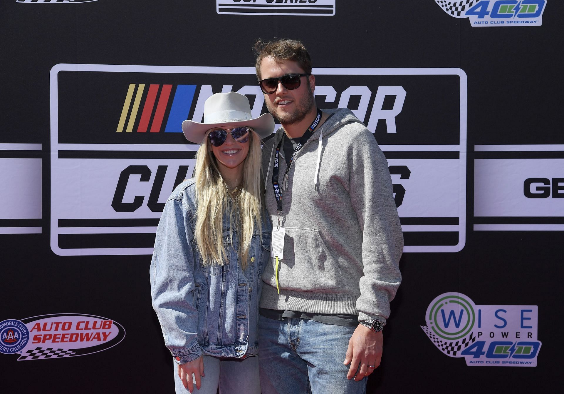 Kelly and Matthew Stafford attending NASCAR Cup Series Wise Power 400