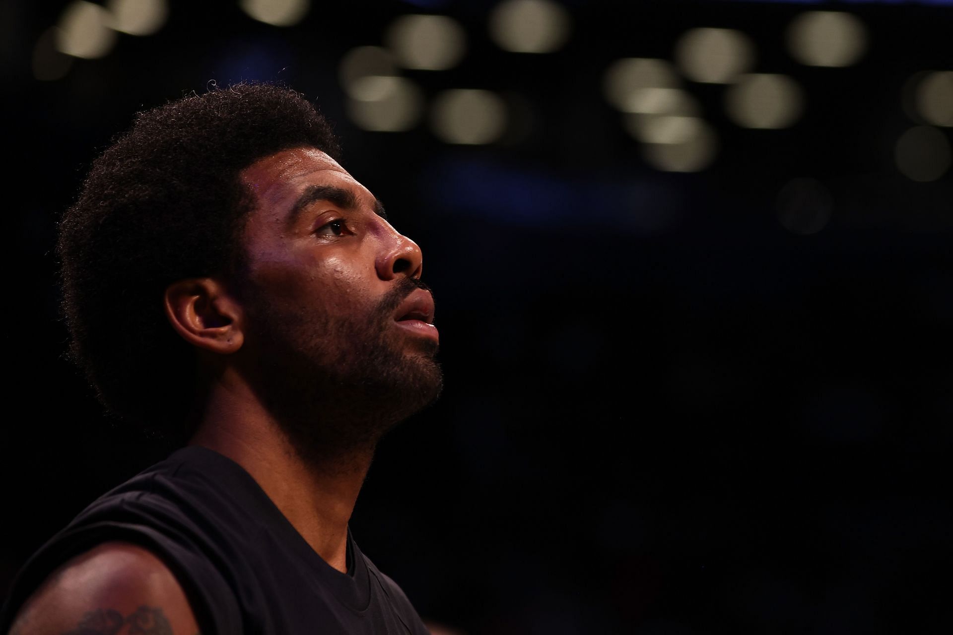 Kyrie Irving warms up before a game