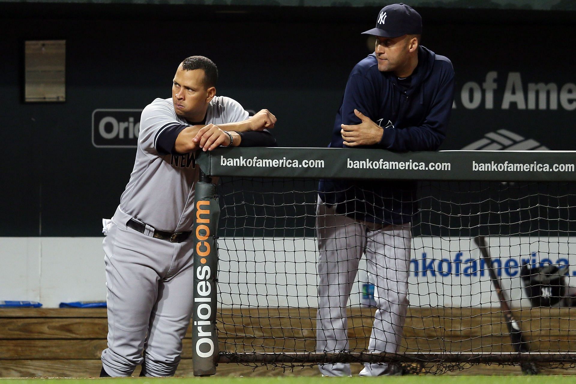 Jeter and A-Rod hang out in the dugout during a New York Yankees v Baltimore Orioles game.