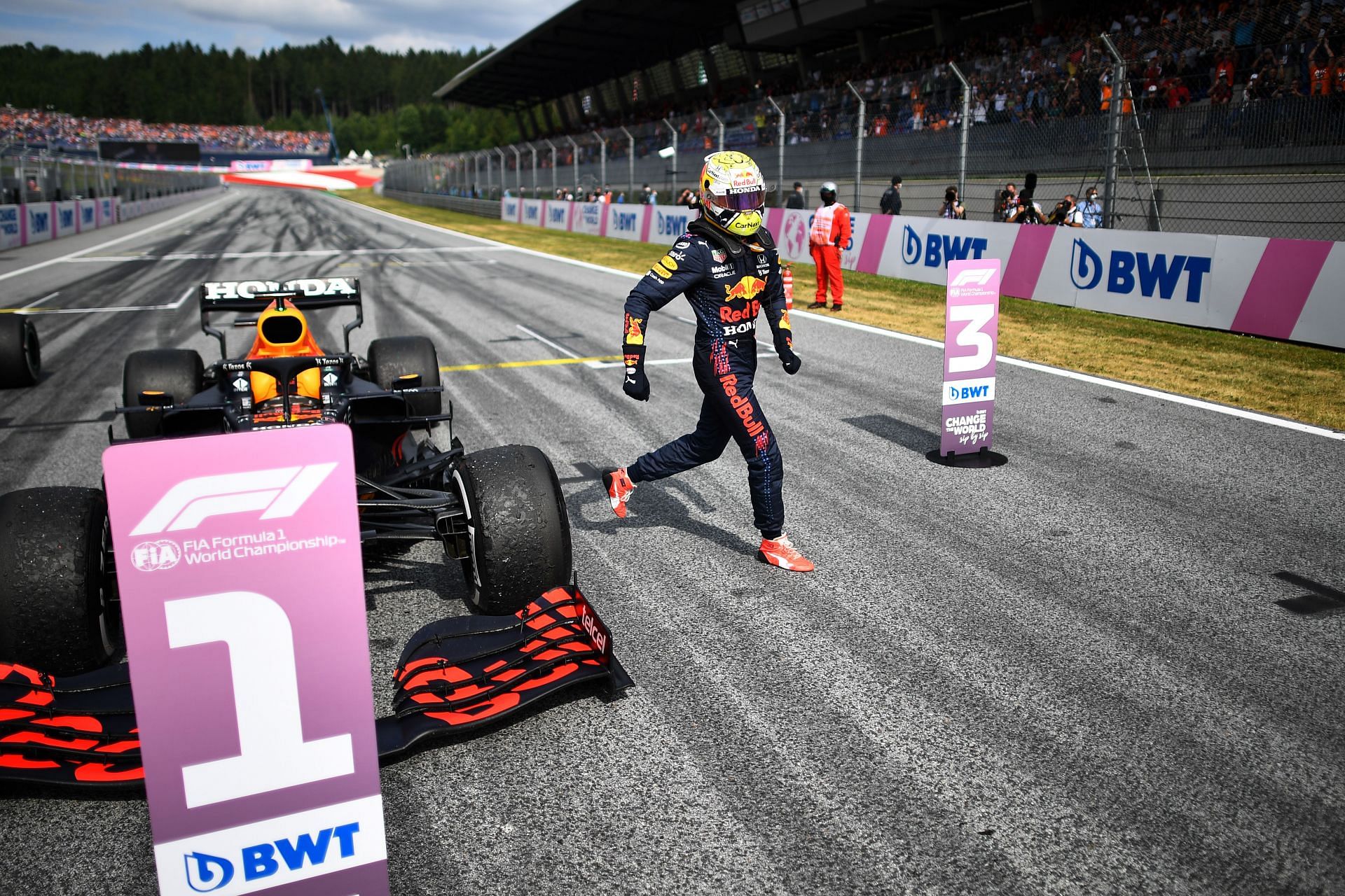 Red Bull driver Max Verstappen celebrates after winning the 2021 F1 Austrian GP (Photo by Christian Bruna - Pool/Getty Images)