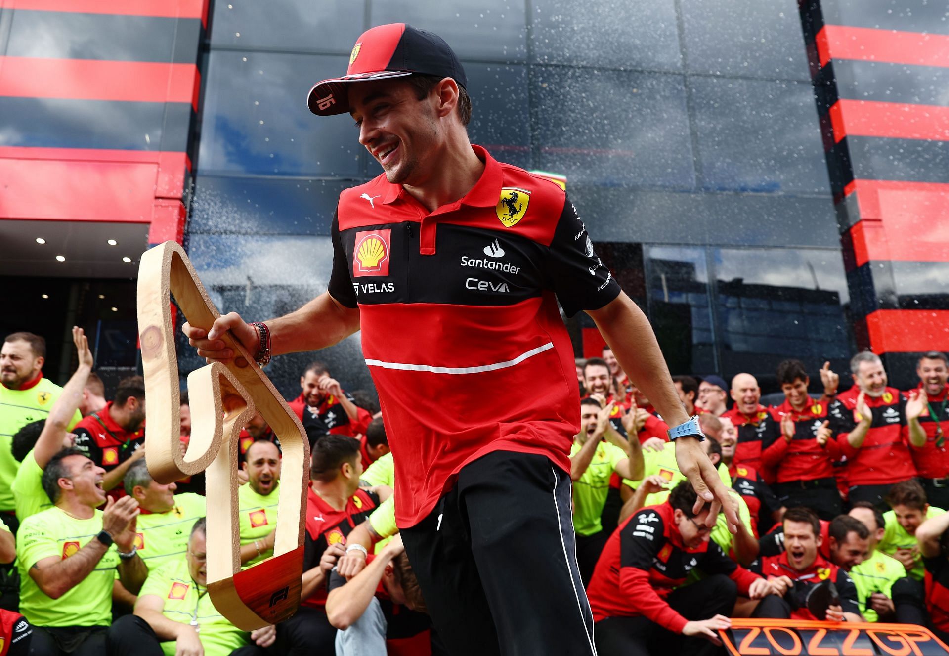 Race winner Charles Leclerc celebrates with his team after the F1 Grand Prix of Austria at Red Bull Ring on July 10, 2022, in Spielberg, Austria (Photo by Clive Rose/Getty Images)