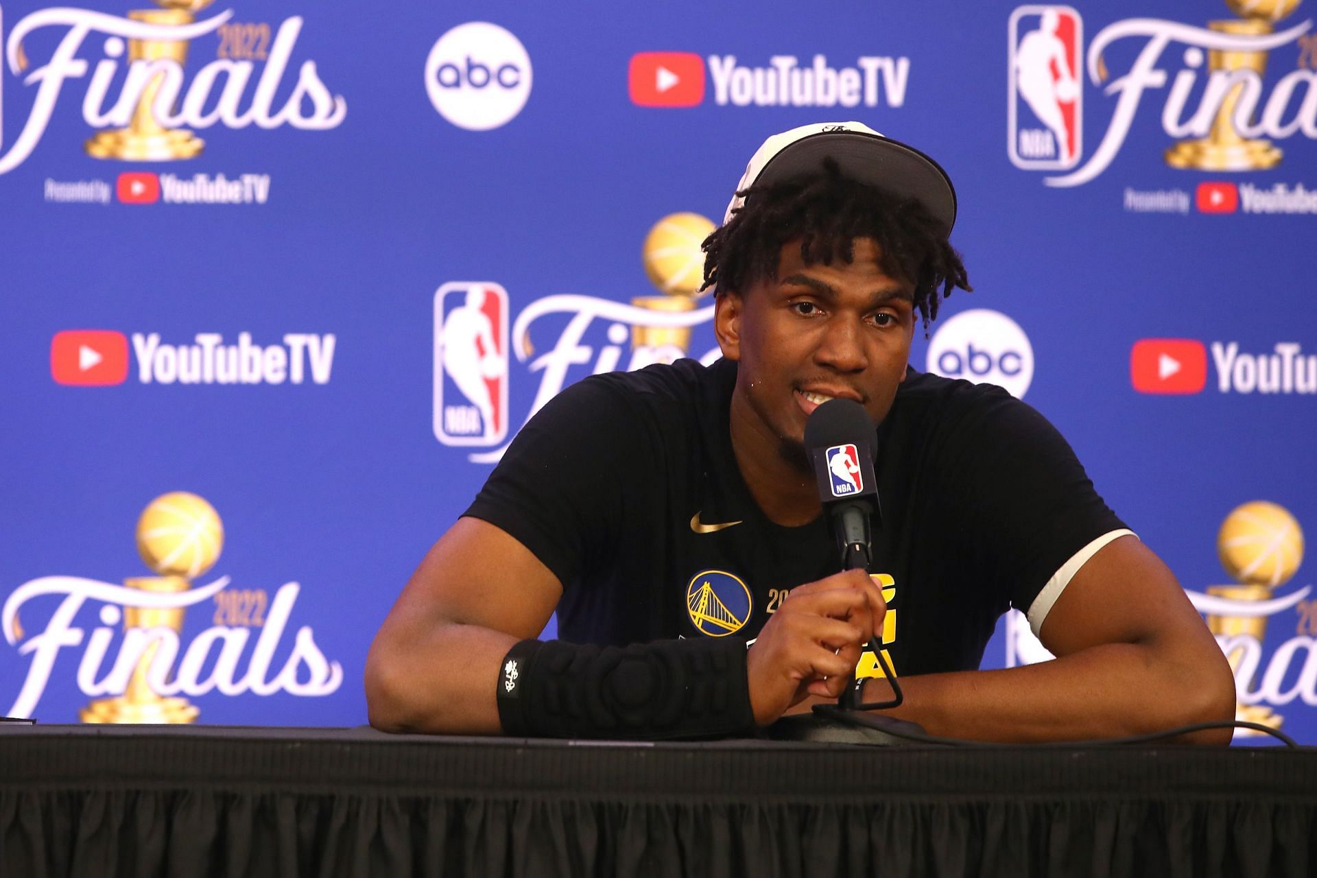 Warriors center Kevon Looney attends a press conference after the 2022 NBA Finals - Game Six