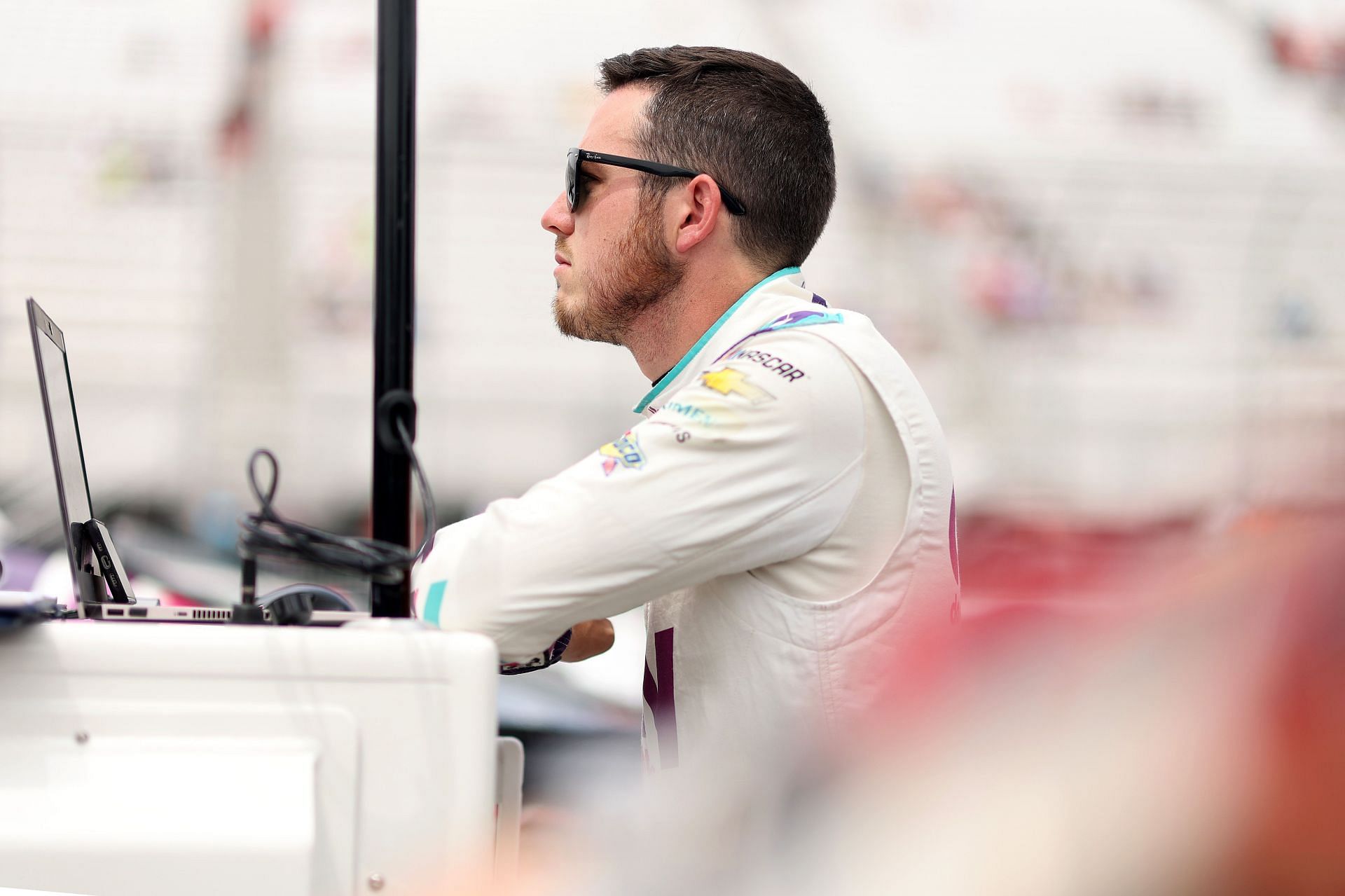 Alex Bowman looks on during practice for the 2022 NASCAR Cup Series Ambetter 301 at New Hampshire Motor Speedway in Loudon, New Hampshire. (Photo by James Gilbert/Getty Images)